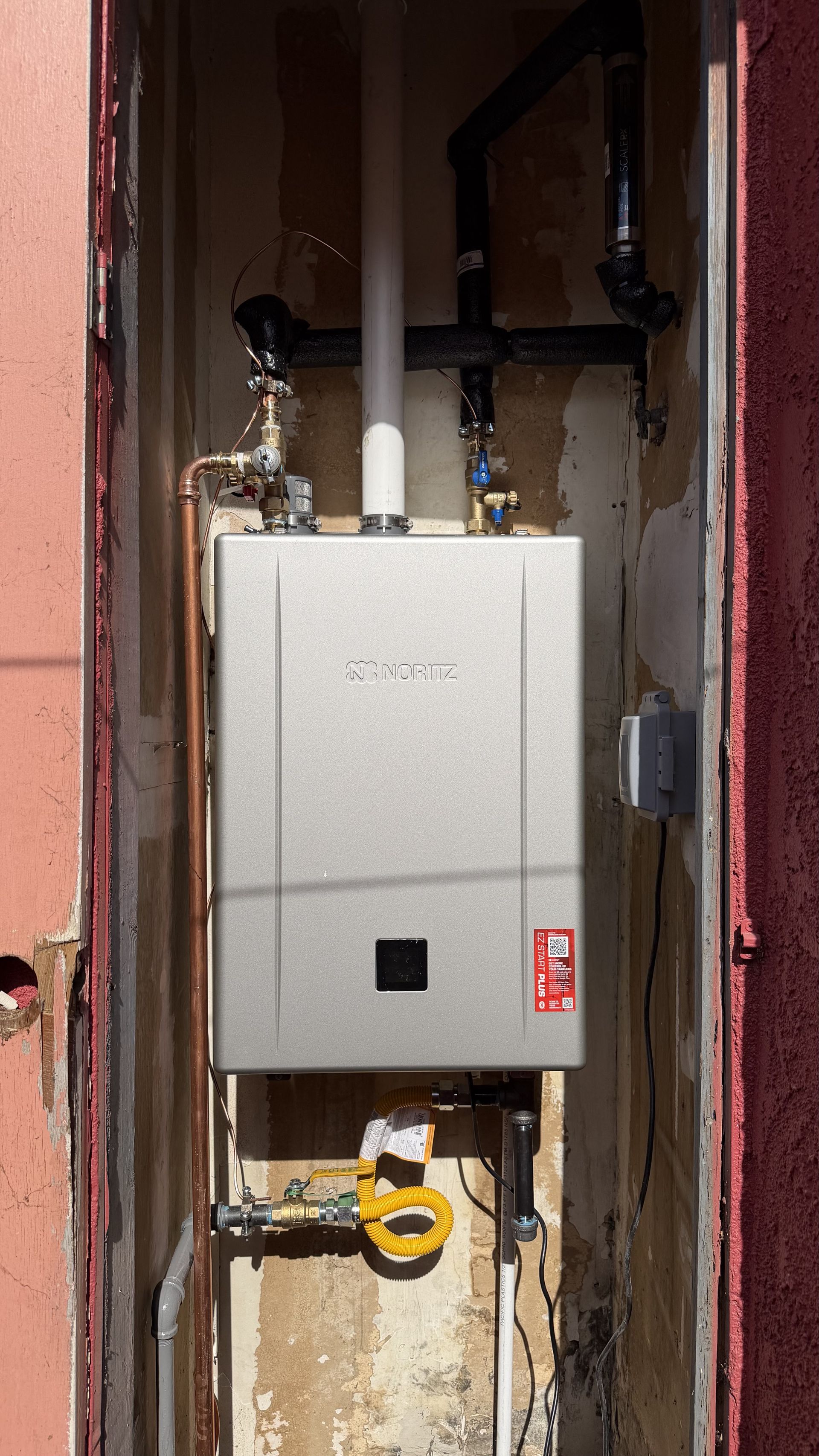 JJJ Plumbing workshop and Navien tankless water heater installation